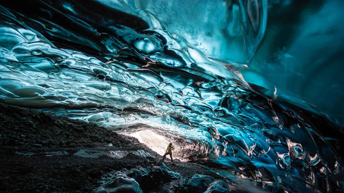 Blue ice cave interior on a remote glacier hike from Jökulsárlón glacier lagoon, Vatnajökull, Iceland